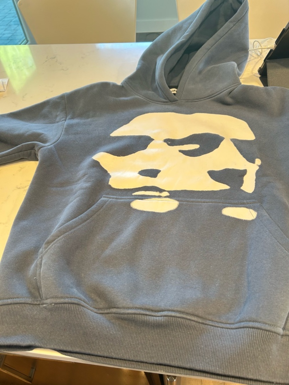 Men's Blue Pullover Hoodie with Cream Face Graphic